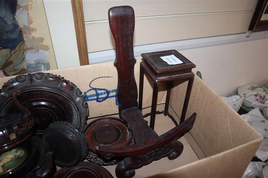 A group of Chinese wood stands including a dish stand